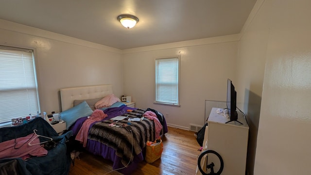 14024 Rossini Dr, Detroit, MI 48205 - bedroom with visible vents, hardwood / wood-style flooring, and baseboards