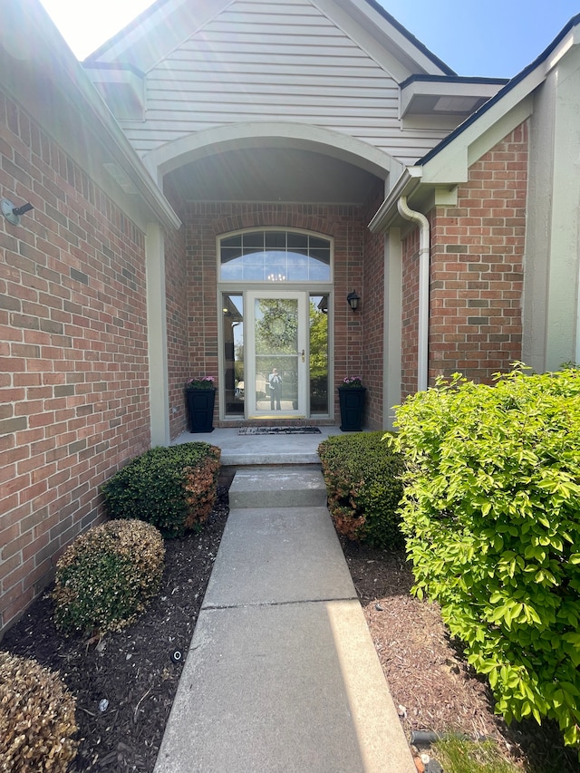 6181 Warwick Dr, Commerce Twp, MI 48382 - view of exterior entry with brick siding