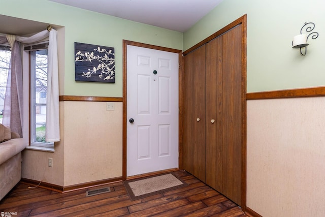 6051 Homestead Pl, Grand Blanc, MI 48439 - entryway with plenty of natural light, dark wood-type flooring, and visible vents