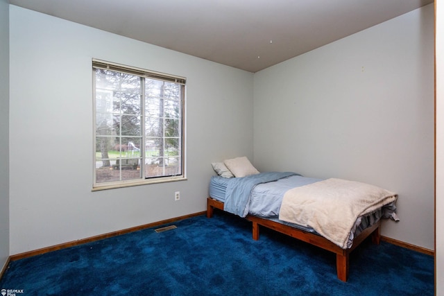 6051 Homestead Pl, Grand Blanc, MI 48439 - bedroom featuring carpet flooring, baseboards, and visible vents