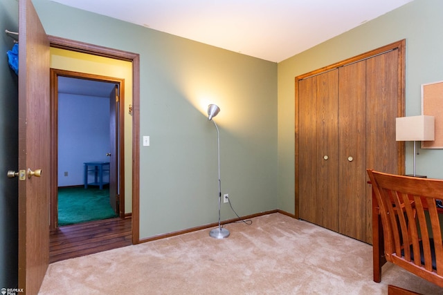 6051 Homestead Pl, Grand Blanc, MI 48439 - unfurnished bedroom featuring a closet, baseboards, and carpet flooring