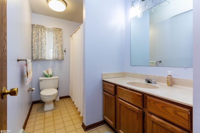 6051 Homestead Pl, Grand Blanc, MI 48439 - bathroom with toilet, tile patterned floors, vanity, and baseboards