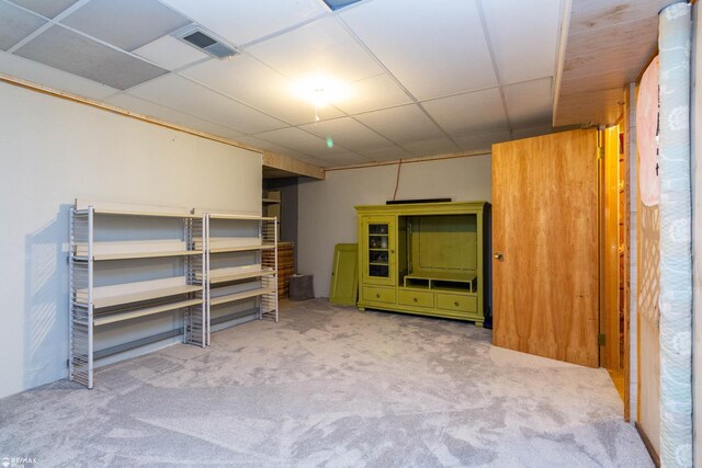 6051 Homestead Pl, Grand Blanc, MI 48439 - finished below grade area featuring a paneled ceiling, visible vents, and carpet floors