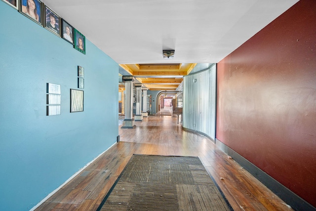70700 Ironwood Dr, Niles, MI 49120 - hall with hardwood / wood-style floors, baseboards, and arched walkways