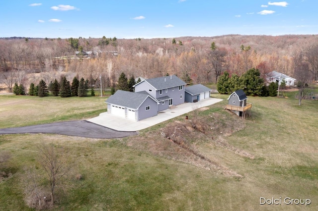 aerial view with a wooded view