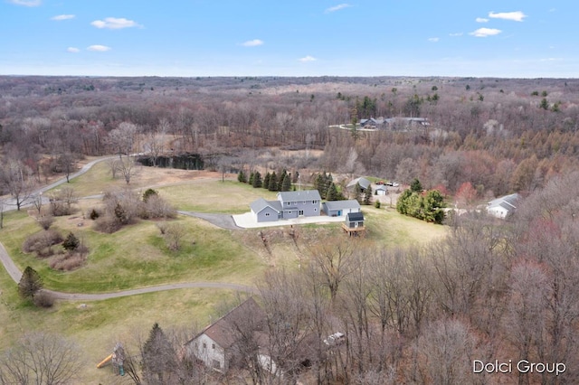 bird's eye view featuring a view of trees