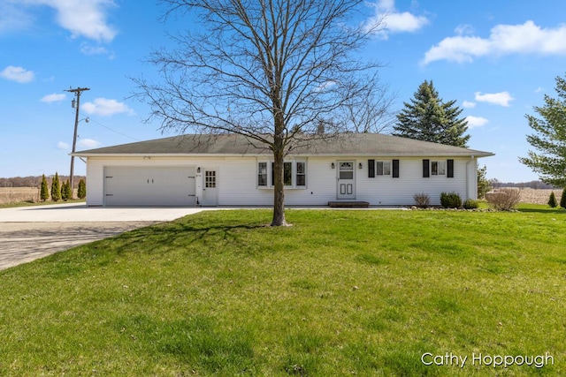 ranch-style house with a front yard, a garage, and concrete driveway