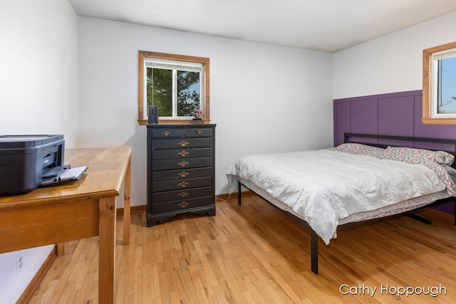 bedroom featuring light wood-style floors