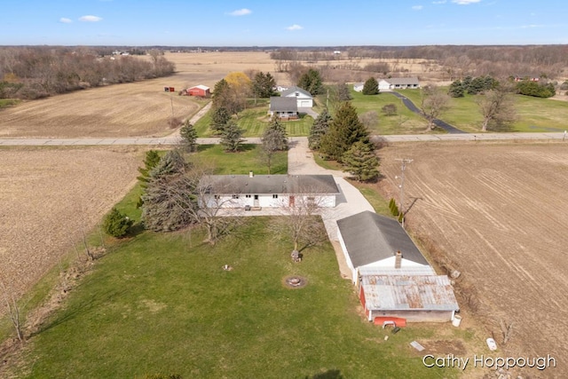 birds eye view of property featuring a rural view