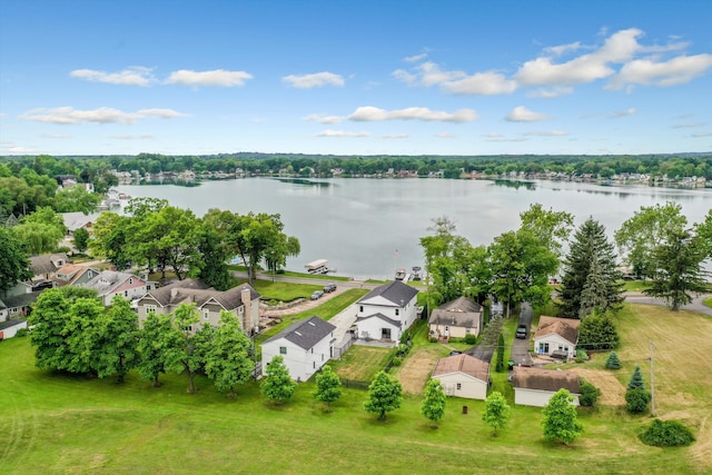 aerial view with a residential view and a water view