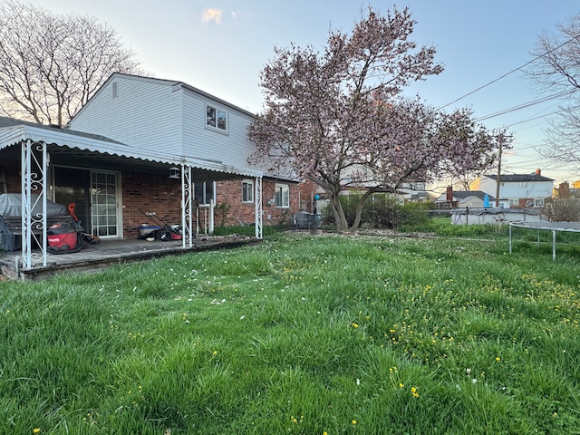 29318 Orvylle Dr, Warren, MI 48092 - view of yard with a trampoline