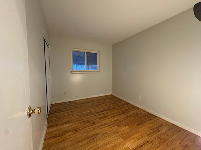 29318 Orvylle Dr, Warren, MI 48092 - spare room with baseboards, visible vents, and light wood-type flooring