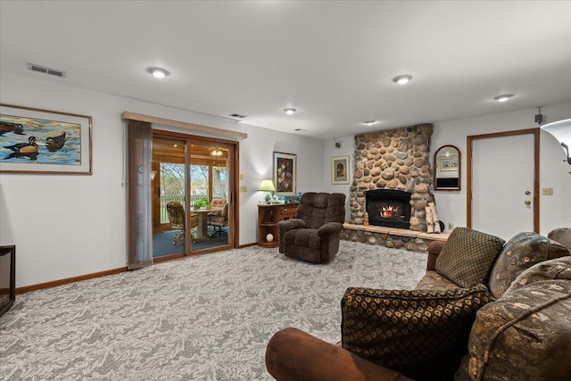 2745 Lari Ct, West Bloomfield, MI 48324 - living room featuring a fireplace, carpet flooring, baseboards, and visible vents