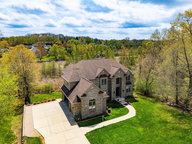 9025 Huron Bluffs Dr, White Lake, MI 48386 - birds eye view of property with a forest view