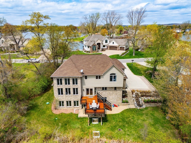 9025 Huron Bluffs Dr, White Lake, MI 48386 - back of property with a yard and stairway