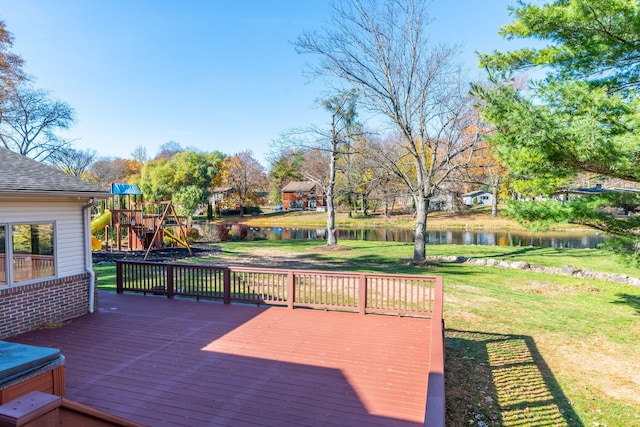 29632 Pond Ridge Rd, Farmington Hills, MI 48334 - deck featuring a yard, a playground, and a water view
