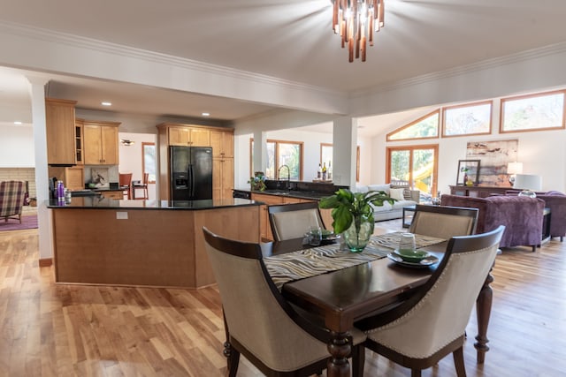 29632 Pond Ridge Rd, Farmington Hills, MI 48334 - dining room with ornamental molding and light wood-style flooring