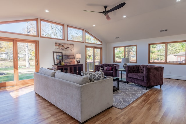 29632 Pond Ridge Rd, Farmington Hills, MI 48334 - living room featuring a ceiling fan, light wood-type flooring, lofted ceiling, and visible vents