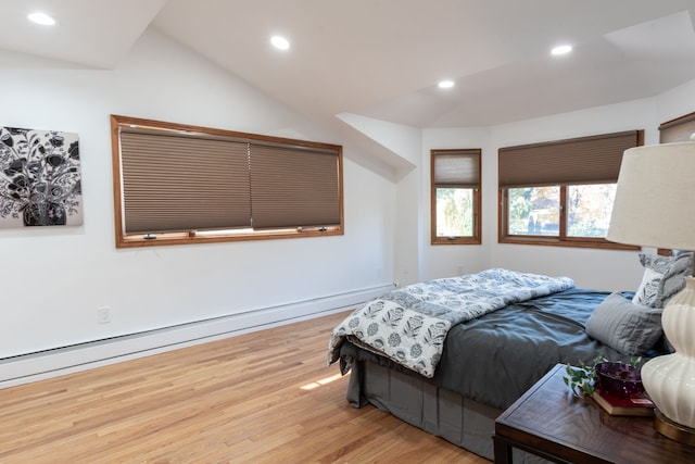 29632 Pond Ridge Rd, Farmington Hills, MI 48334 - bedroom featuring light wood finished floors, vaulted ceiling, a baseboard heating unit, and recessed lighting
