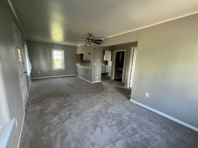 25763 Gibraltar Rd, Flat Rock, MI 48134 - unfurnished living room featuring baseboards, ornamental molding, a ceiling fan, and dark colored carpet