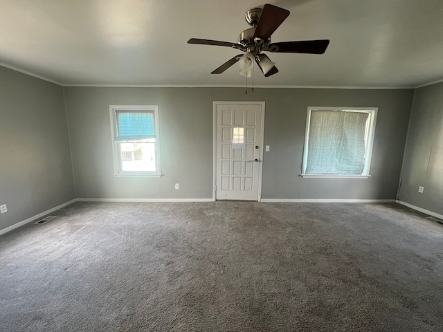 25763 Gibraltar Rd, Flat Rock, MI 48134 - carpeted spare room with crown molding and baseboards