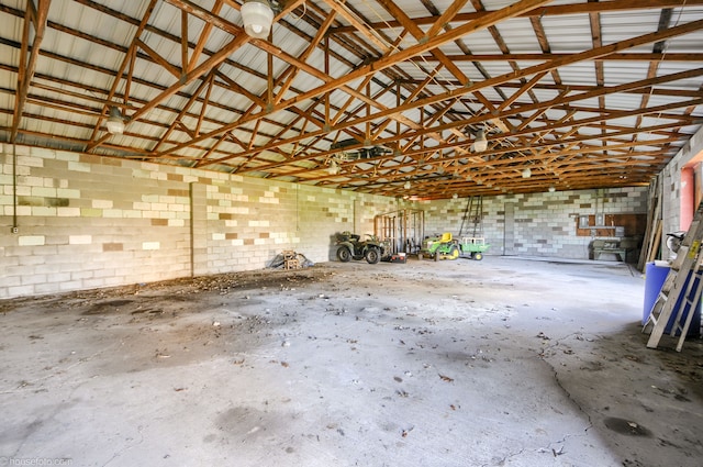 garage featuring concrete block wall
