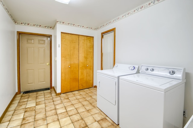 laundry room with washing machine and dryer and laundry area