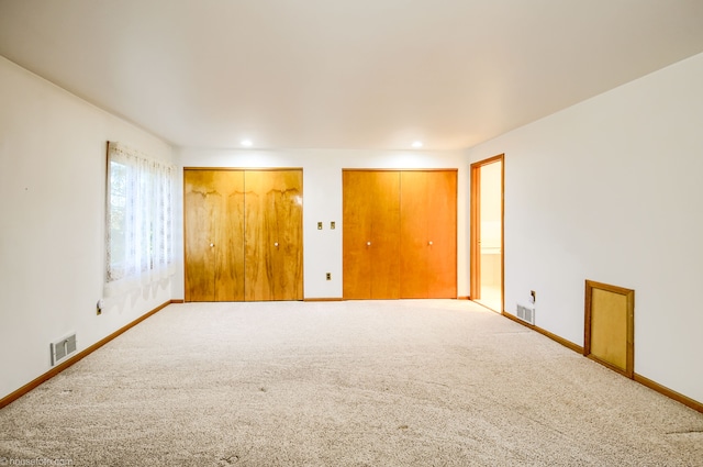 interior space featuring baseboards, visible vents, and recessed lighting