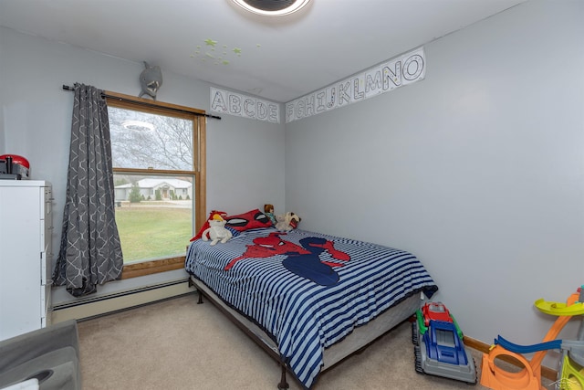 bedroom with carpet flooring and baseboard heating