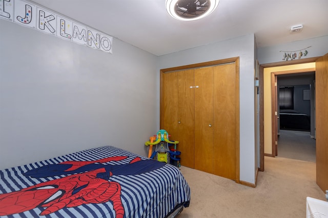 bedroom with baseboards and carpet floors