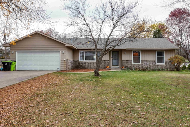 ranch-style house featuring an attached garage, driveway, a front yard, and brick siding