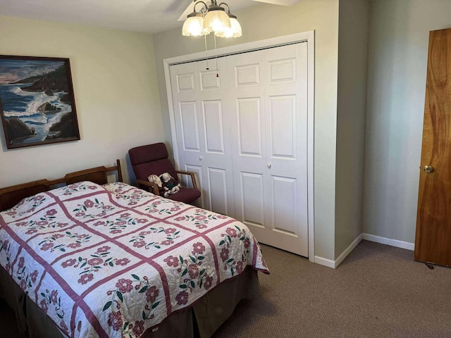 18175 Lake Dr, Big Rapids, MI 49307 - bedroom with carpet flooring, a closet, and baseboards