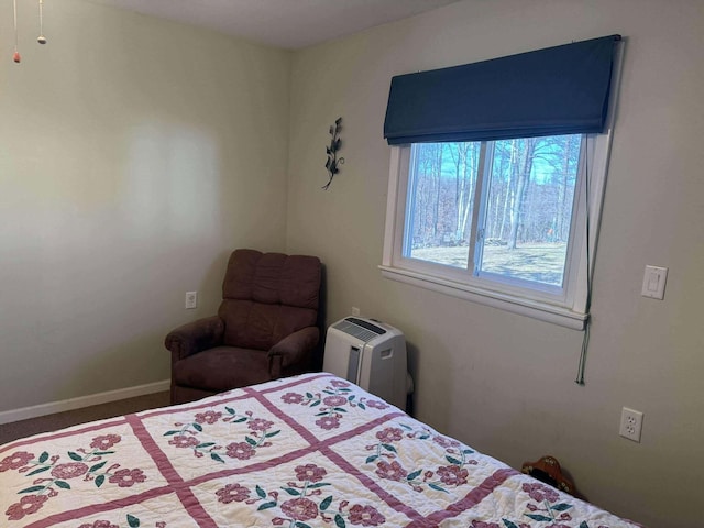 18175 Lake Dr, Big Rapids, MI 49307 - carpeted bedroom featuring baseboards