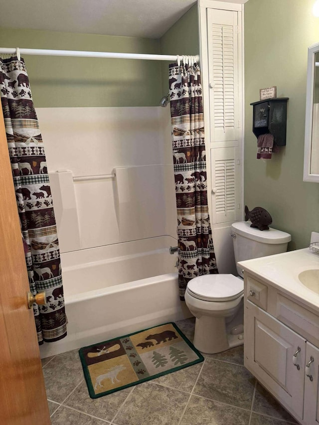18175 Lake Dr, Big Rapids, MI 49307 - bathroom with tile patterned floors, vanity, shower / bath combination with curtain, and toilet
