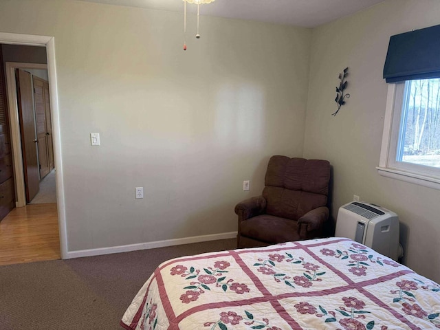 18175 Lake Dr, Big Rapids, MI 49307 - bedroom with baseboards and carpet flooring