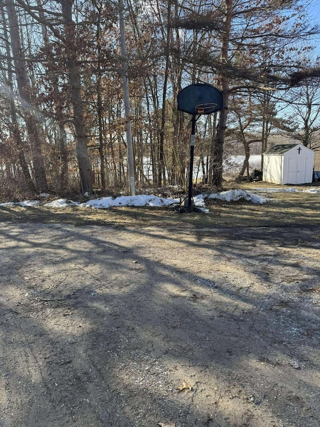 18175 Lake Dr, Big Rapids, MI 49307 - view of yard with a storage shed and an outbuilding