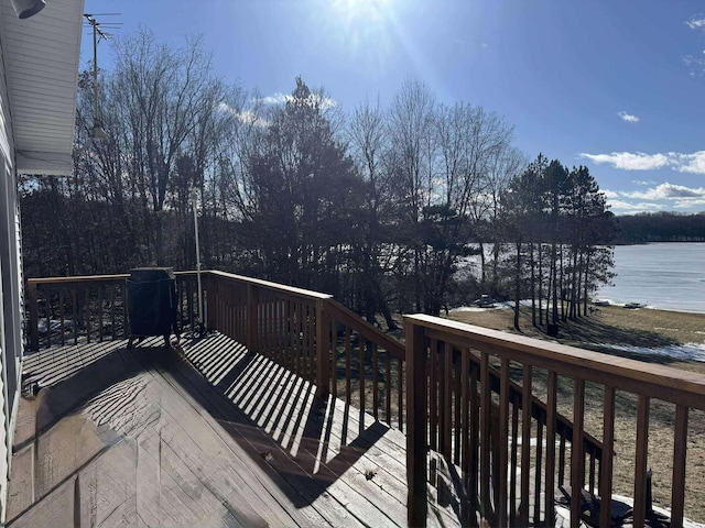 18175 Lake Dr, Big Rapids, MI 49307 - wooden terrace featuring a water view