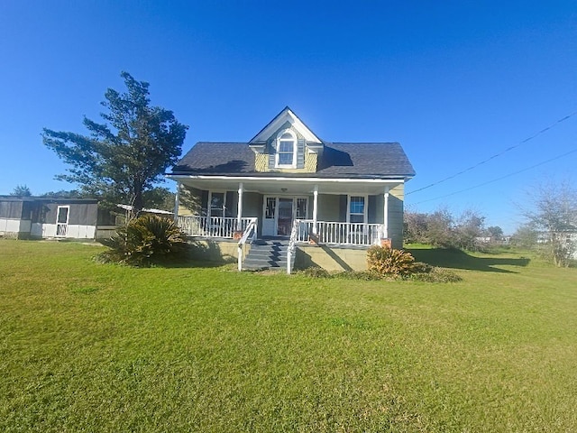bungalow-style home with a porch and a front yard