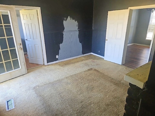 interior space with visible vents and baseboards