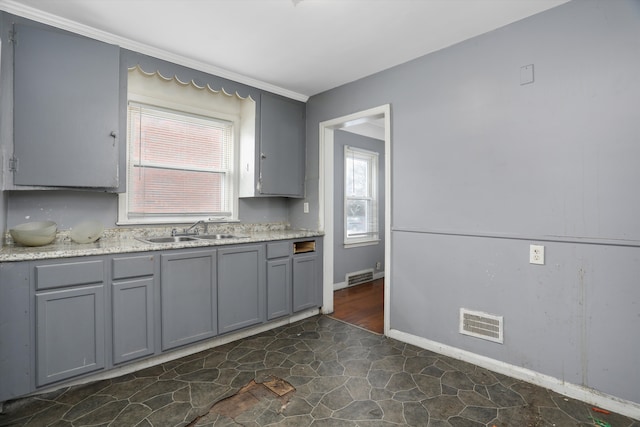 11248 Kennebec, Detroit, MI 48205 - kitchen with a sink, gray cabinets, and visible vents