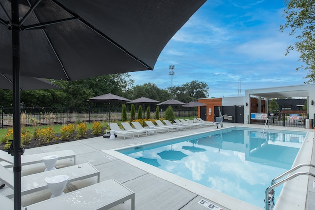533 E Harrison Ave Unit 29, Royal Oak, MI 48067 - pool with fence and a patio area