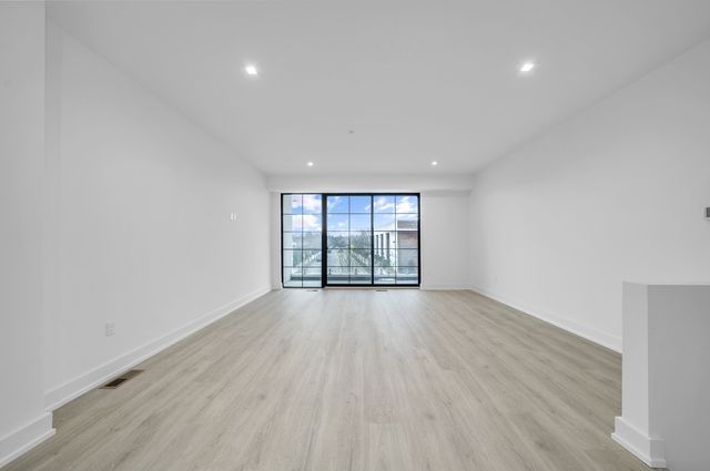 533 E Harrison Ave Unit 29, Royal Oak, MI 48067 - unfurnished room featuring visible vents, recessed lighting, baseboards, and light wood-type flooring