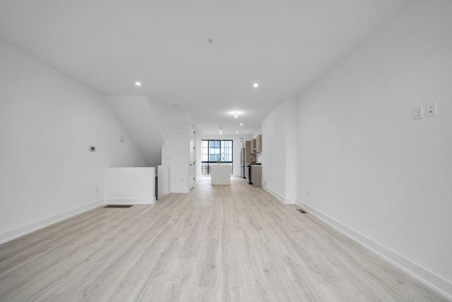 533 E Harrison Ave Unit 29, Royal Oak, MI 48067 - bonus room featuring recessed lighting, baseboards, and light wood-type flooring