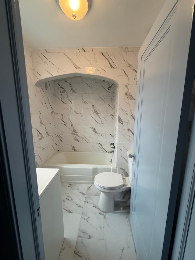 2651 Neibel St, Hamtramck, MI 48212 - bathroom with shower / bathing tub combination, toilet, marble finish floor, and vanity