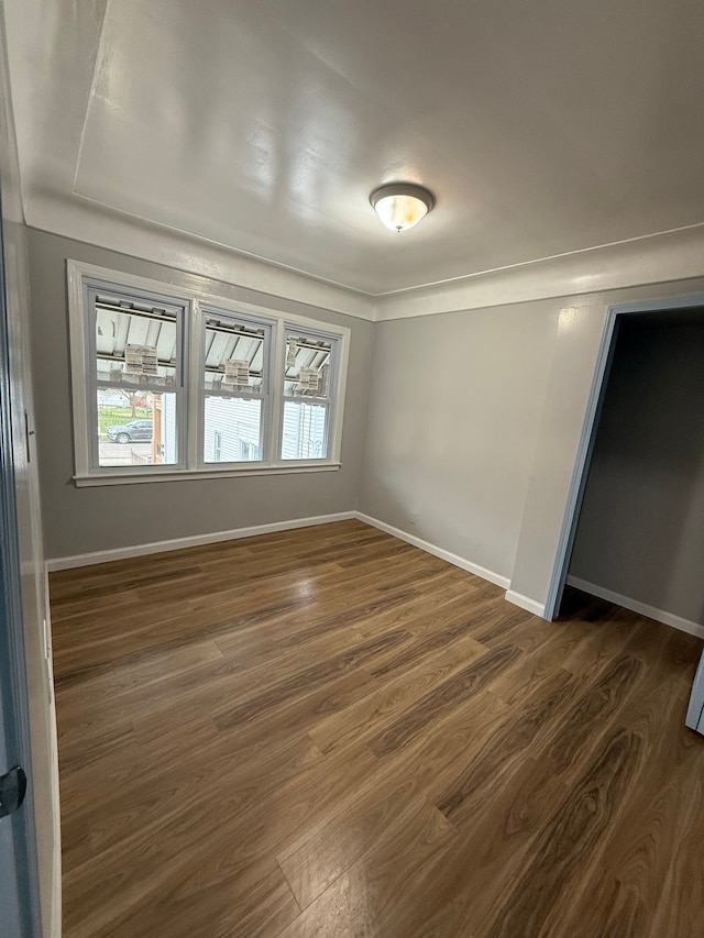 2651 Neibel St, Hamtramck, MI 48212 - empty room with baseboards and dark wood-style floors