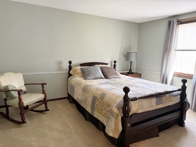 12131 Brandywine Dr, Brighton, MI 48114 - bedroom featuring light carpet and baseboards