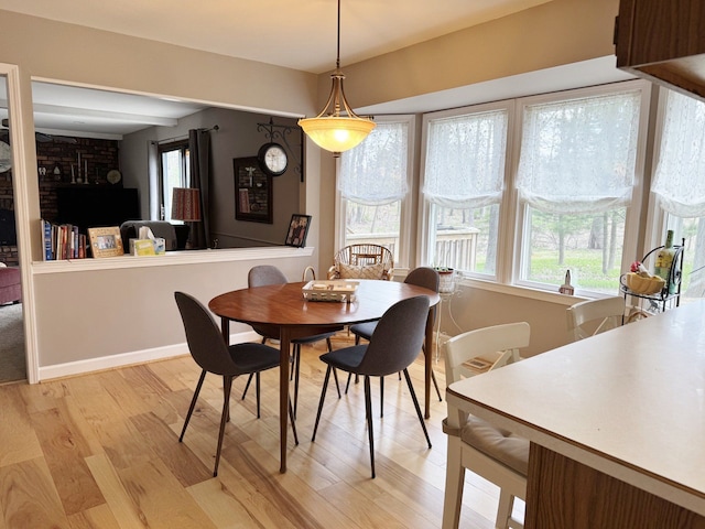 12131 Brandywine Dr, Brighton, MI 48114 - dining space featuring light wood-type flooring