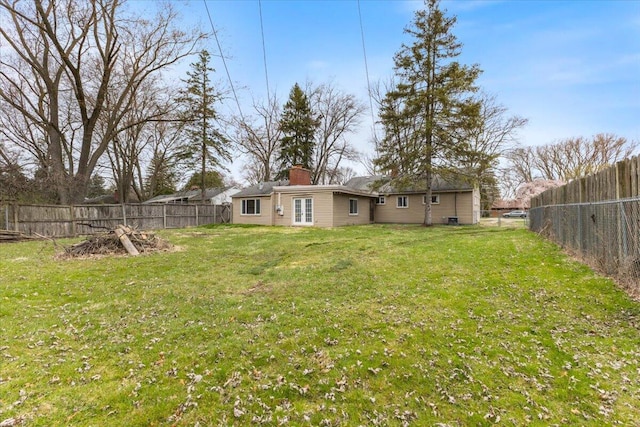 view of yard featuring a fenced backyard