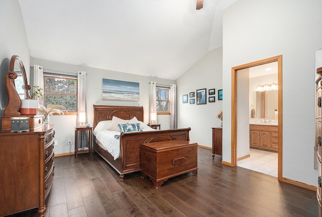 3804 Lincoln Ave, Saint Joseph, MI 49085 - bedroom featuring high vaulted ceiling, multiple windows, baseboards, and wood finished floors