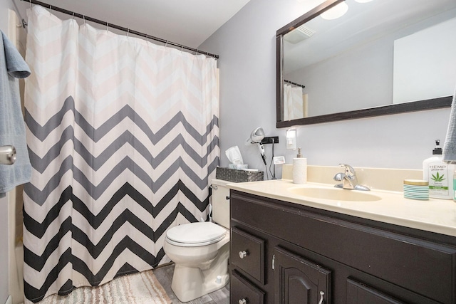 3804 Lincoln Ave, Saint Joseph, MI 49085 - full bath with toilet, vanity, and a shower with curtain